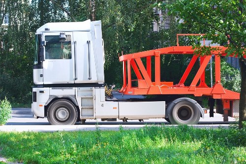 Crew loading a bin for business waste collection